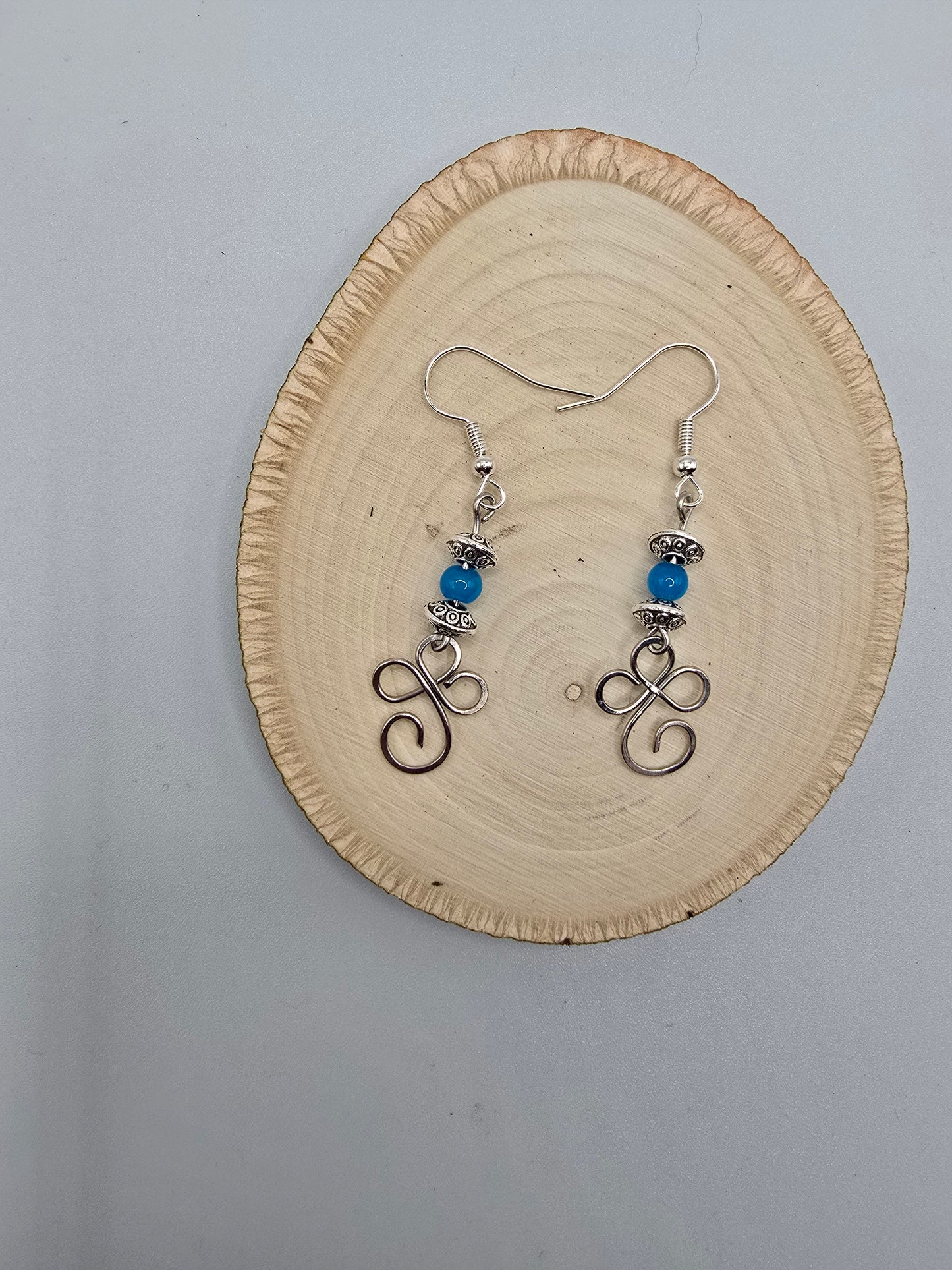 Swirl dangle earrings