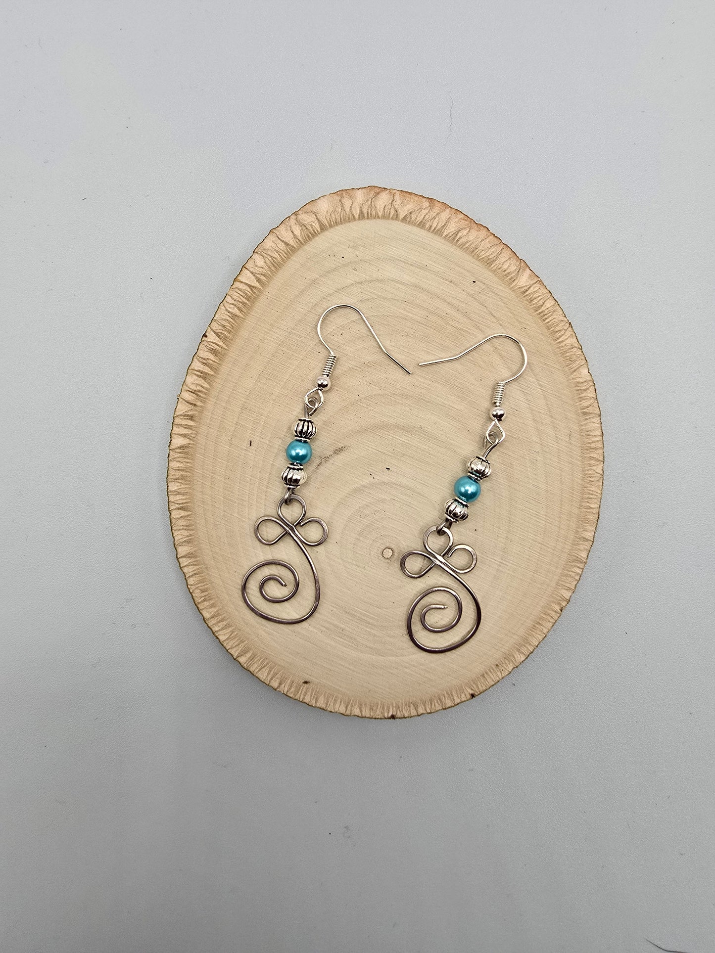 Swirl dangle earrings
