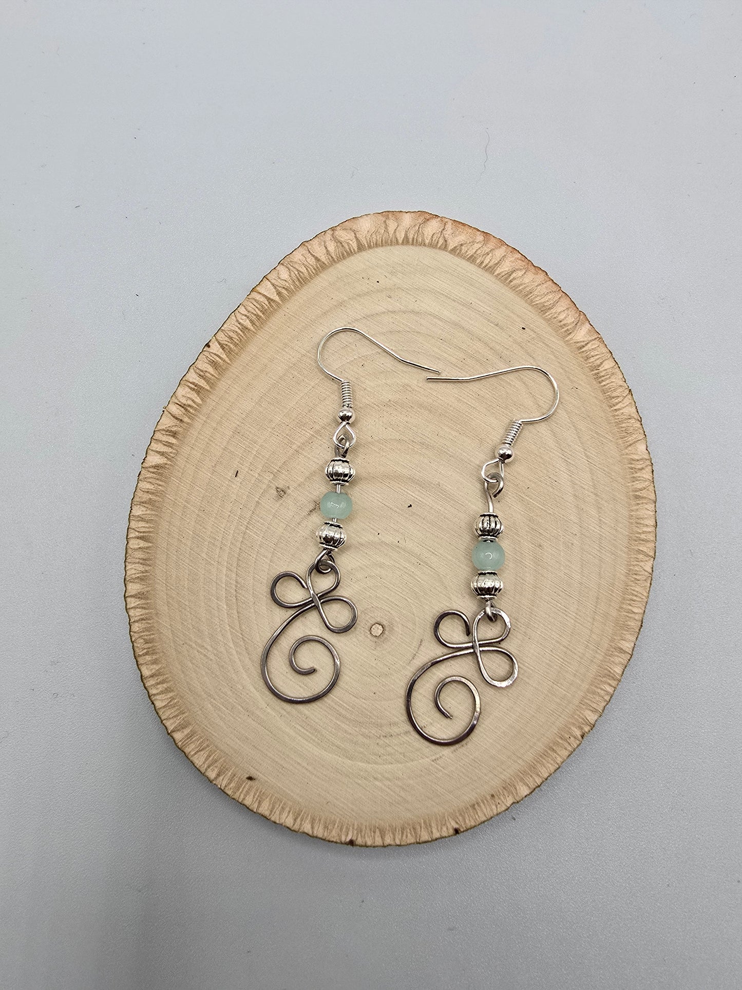 Swirl dangle earrings